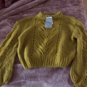 A mustard yellow sweater from SILVERFLINT!